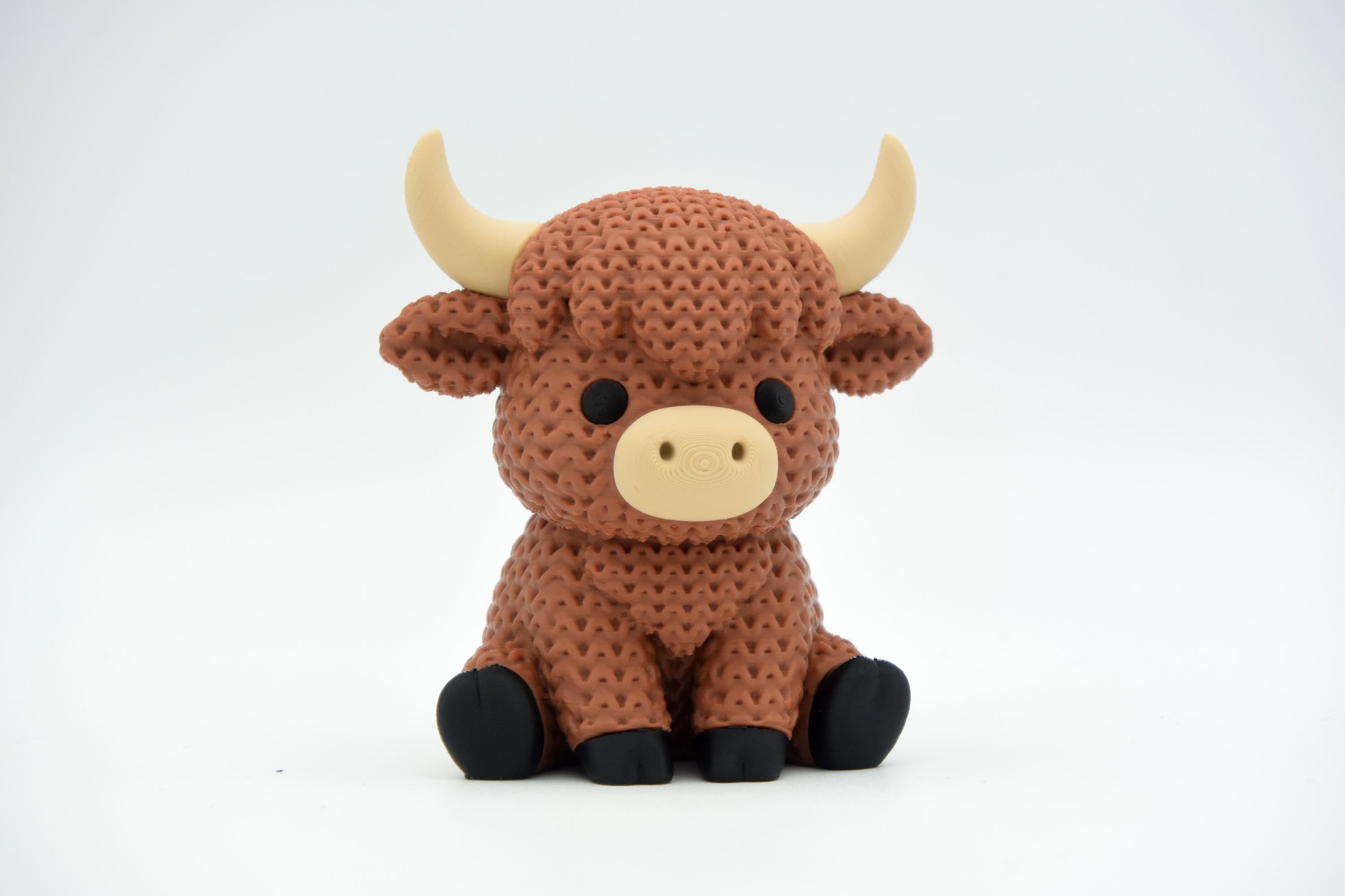 Highland Cow Figure: Knitted Texture Design.