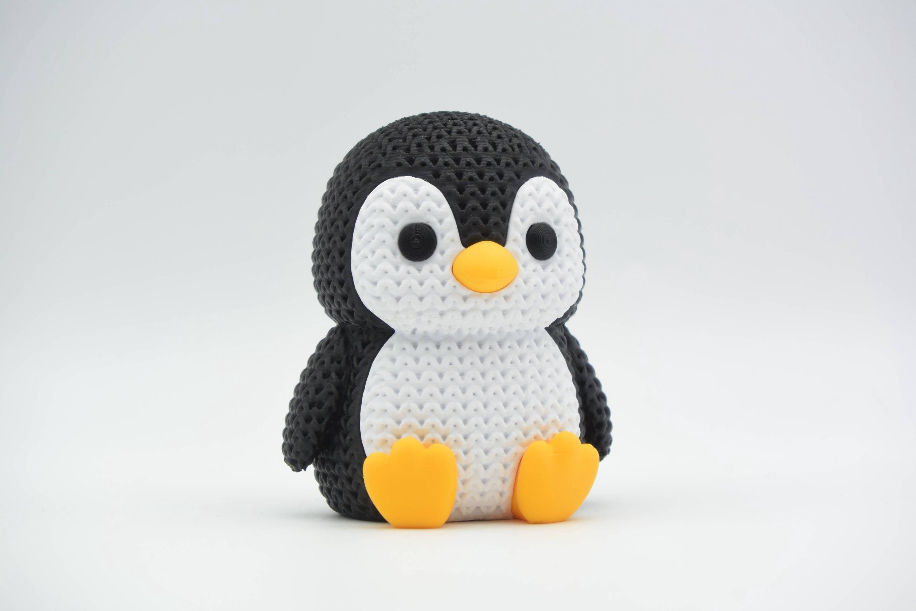 Penguin Figure: Knitted Texture Design.