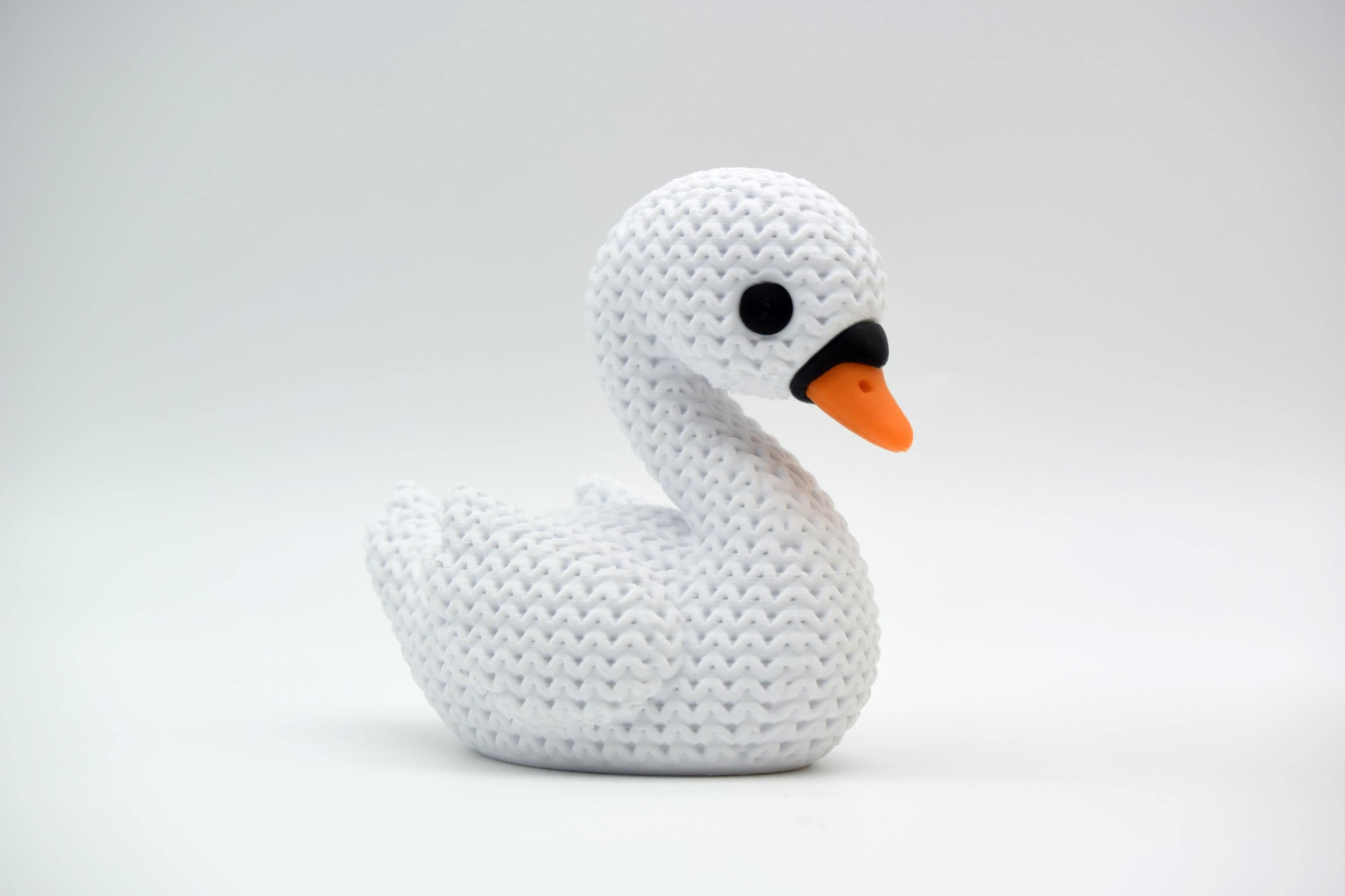 Swan Figure: Knitted Texture Design.