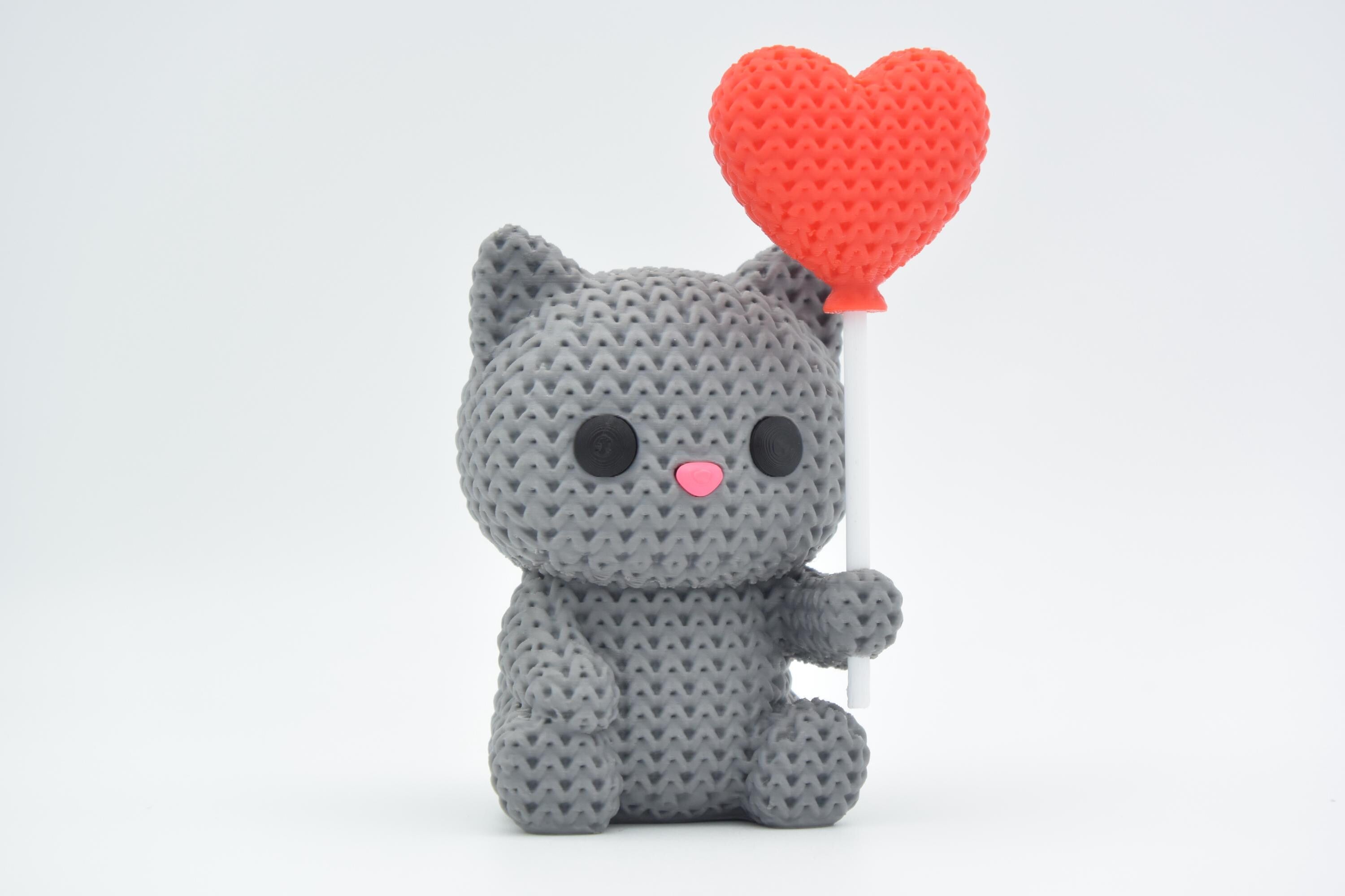 Knitted Animal Figure with Heart.