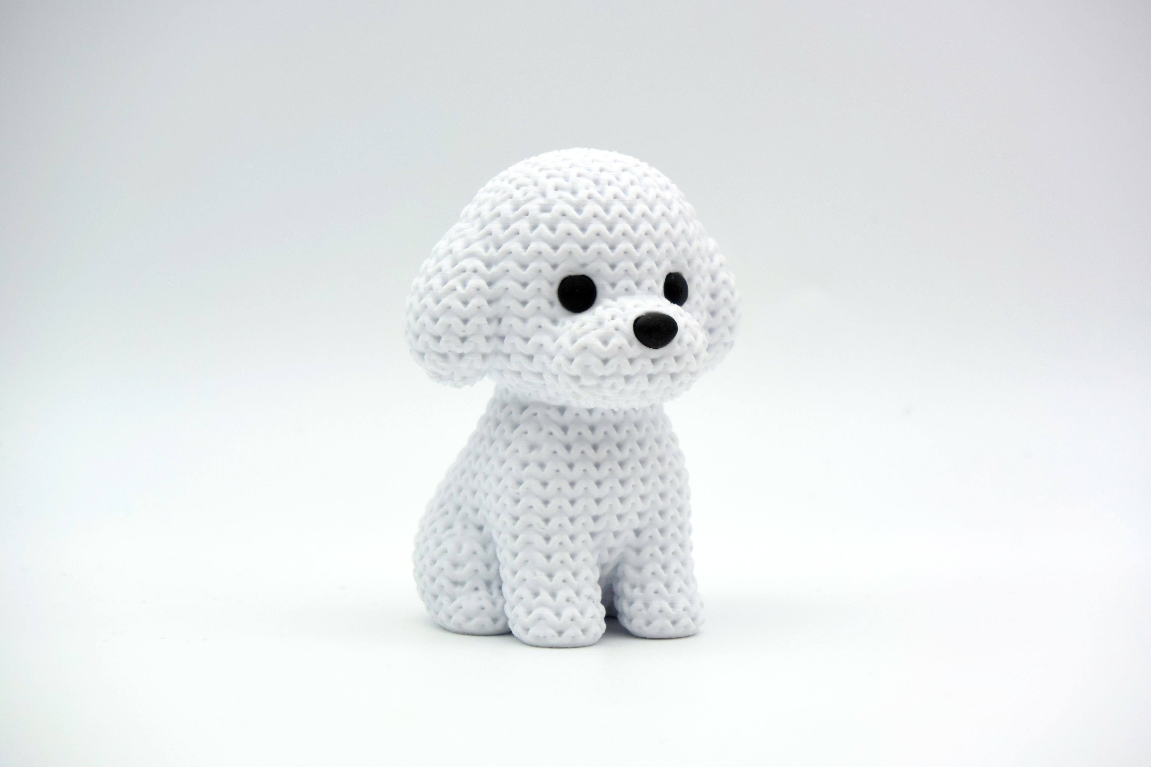 Bichon Frise Figure: Knitted Texture Design.