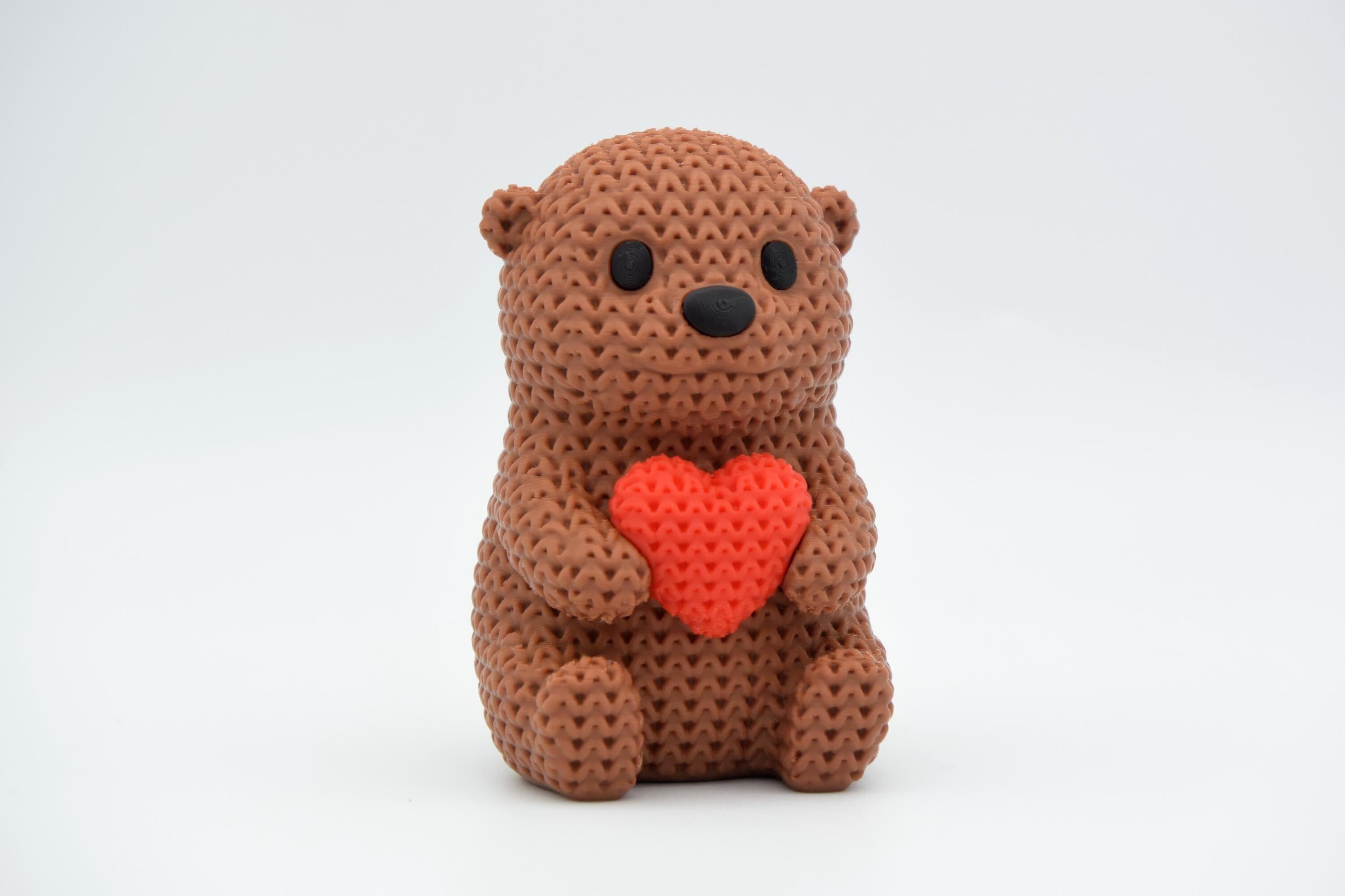 Knitted Animal Figure with Heart.