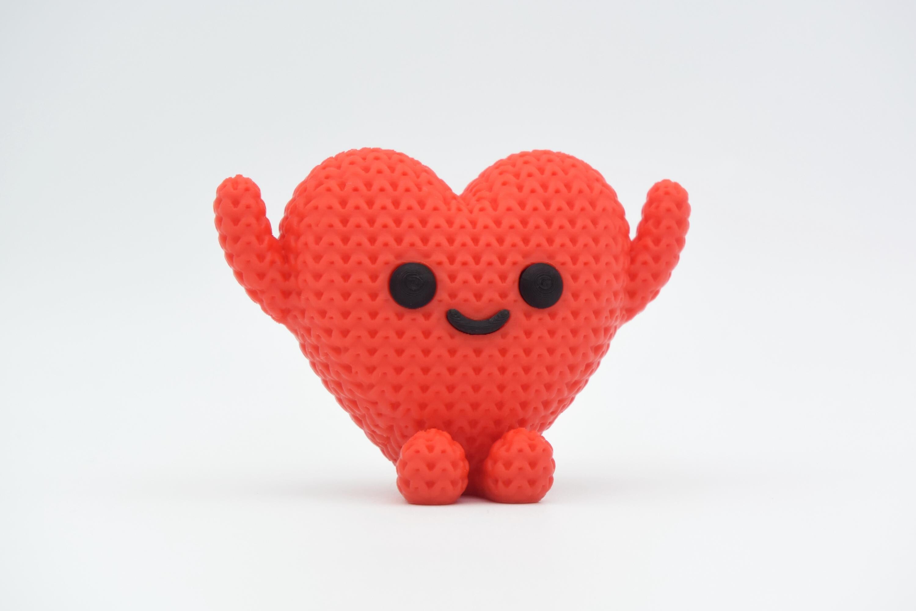 Knitted Animal Figure with Heart.